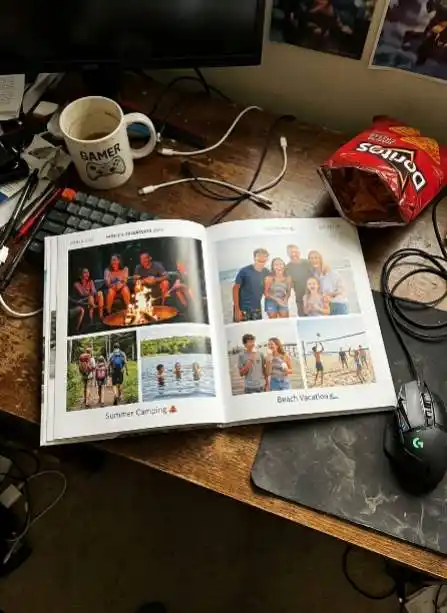 High-quality printed Blurb custom photo book on a teenager's desk