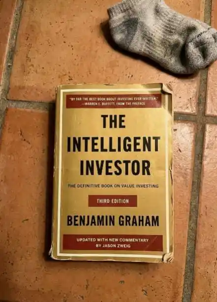 Paperback copy of The Intelligent Investor book by Benjamin Graham